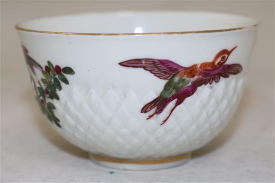 A Chelsea gold anchor petal moulded tea bowl and saucer, c.1765, 14cm, loss and restoration to saucer